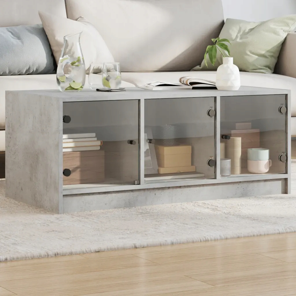 VidaXL Konferenčný stolík so sklenenými dvierkami, betónovo sivý, 102 × 50 × 42 cm